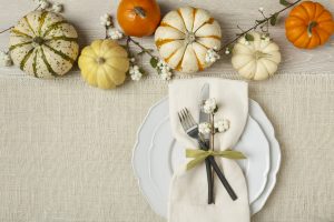 Fall autumn festive table setting place setting with pumpkins, p